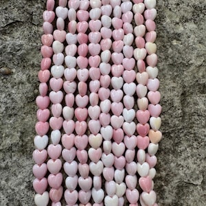 Pink queen conch shell 6mm heart bead strand (16 inch strand)