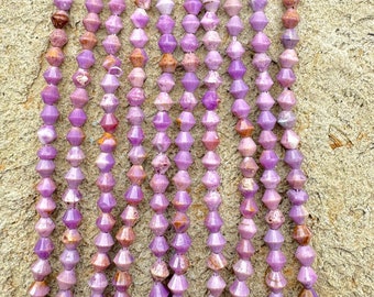 Natural phosphosiderite 4mm faceted bicone beads (15.5 inch strand)