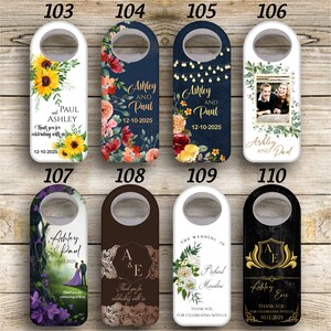 May include: Ten different designs for bottle stoppers. Each bottle stopper has a different design featuring floral patterns, a couple's photo, and text with names and dates. The bottle stoppers are white, black, brown, and cream.