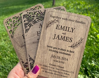 May include: Wooden wedding invitation with laser cut details. The invitation reads "Together with their families Emily and James Invite you to share in their Wedding celebration July 28, 2024 At 06:30 PM Presido Chapel 145 Fisher Loop / San Francisco, CA Dinner and dancing to follow At Bluxome Street Winery"