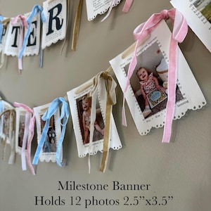 Milestone banner option is the bottom banner only. which includes 12 banner flags for milestone photos (photos not included) it also has velvet bows between each banner flag