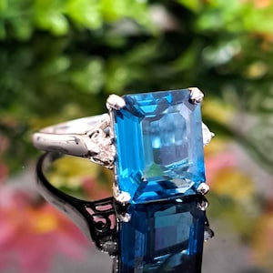14k Gold London Blue Topaz Ring: Emerald Cut Diamond Accent