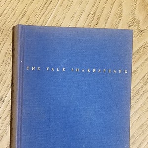 May include: A blue hardcover book with the title "THE YALE SHAKESPEARE" printed in gold lettering on the front cover.
