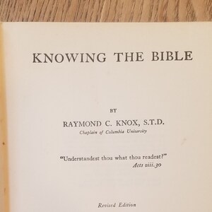May include: A book titled "Knowing the Bible" by Raymond C. Knox, S.T.D., Chaplain of Columbia University. The book was published in 1943 by The Macmillan Company in New York.