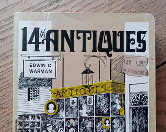 May include: A yellow and black book cover with the title "14th Antiques and their PRICES". The cover features a black and white illustration of an antique shop with a sign that reads "Edwin G. Warman".