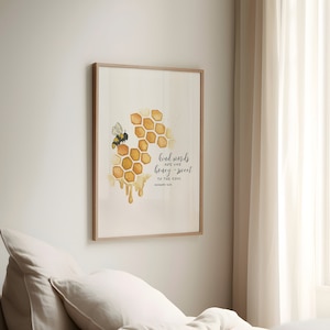 May include: A watercolor painting of a honeycomb with a bee on it. The text "Kind words are like honey - sweet to the soul" is written below the honeycomb. The verse is from Proverbs 16:24.