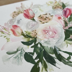 May include: A watercolor painting on white paper featuring a floral arrangement with soft pink and white rose-like blossoms, small red-tipped tulip buds, and various green leaves, rendered with fluid, blended brushstrokes and light washes.