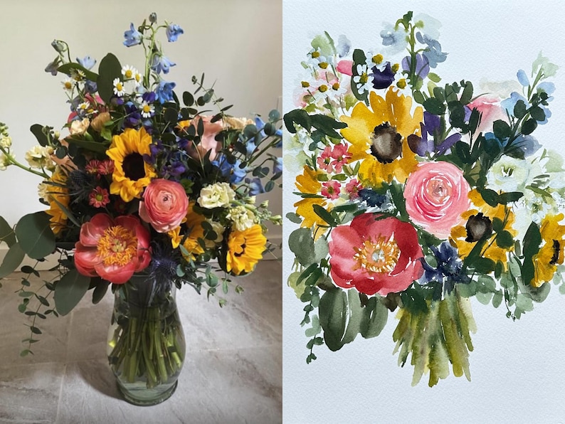 May include: A side-by-side comparison of a fresh floral bouquet in a clear glass vase and a watercolor painting of the same arrangement. The bouquet features yellow sunflowers, a pink ranunculus, a coral peony, blue delphiniums, and greenery.