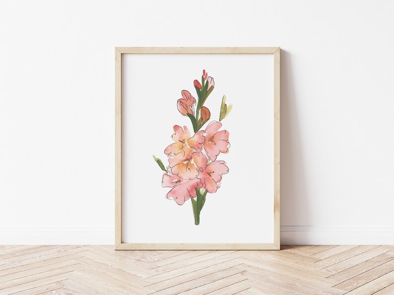 May include: A framed watercolor painting of a pink flower with green stems and leaves. The flower is in bloom and has a delicate, feminine feel.