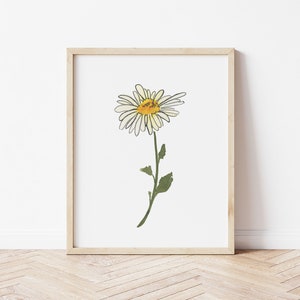 Pu&ograve; includere: Una stampa incorniciata di un singolo margherita bianca con un centro giallo e uno stelo verde. La margherita &egrave; disegnata in uno stile semplice e minimalista.
