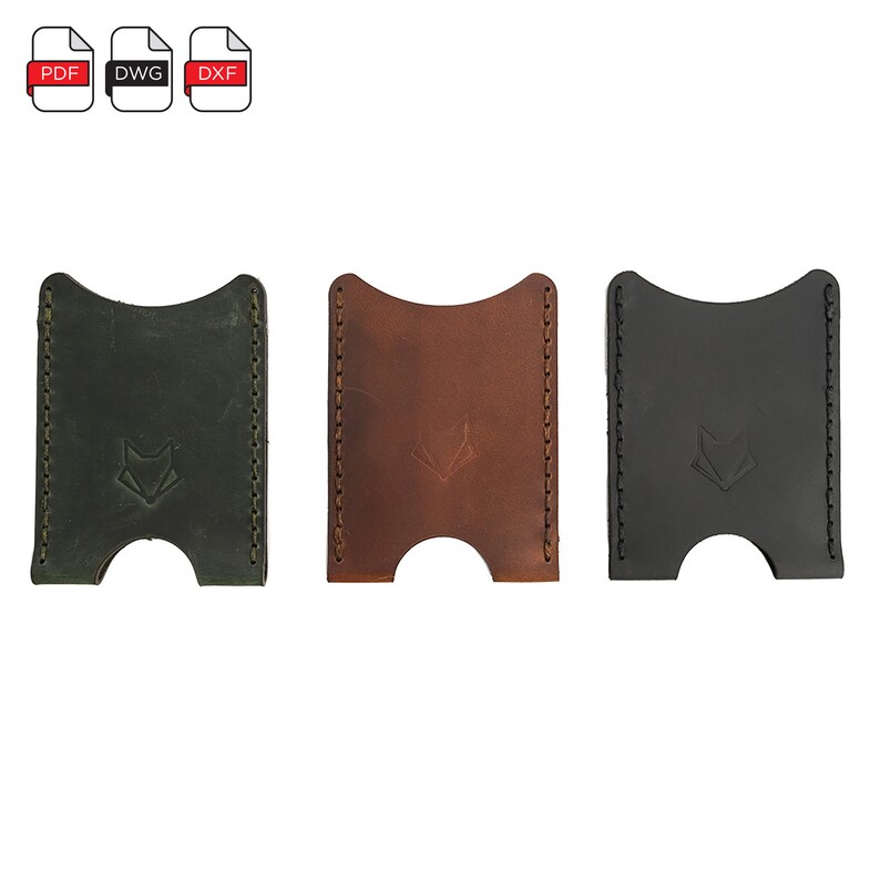 May include: Three leather card holders in green, brown, and black. Each holder has a small fox logo embossed on the front.
