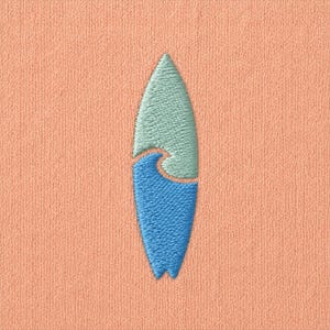 May include: Embroidered surfboard design in light blue and blue on a peach-colored fabric. The surfboard features a wave detail, creating a coastal or beach theme. The embroidery is detailed and the colors are vibrant.