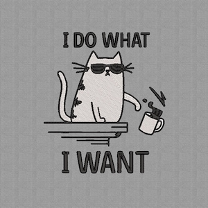 May include: Embroidered design of a cat wearing sunglasses, spilling coffee from a mug. The text reads "I DO WHAT I WANT". The cat is white with black markings, and the design is on a grey background.