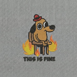 May include: Embroidered patch showing a cartoon dog in a red hat, sitting in a chair, with flames around it. The text "THIS IS FINE" is below the dog. The patch is on a grey background.