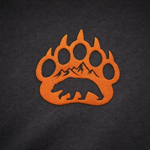 Diseño de bordado de pata de oso en la naturaleza, símbolo de animal de montaña, puntada para camisetas, sudaderas, artículos para exteriores y regalos de naturaleza.