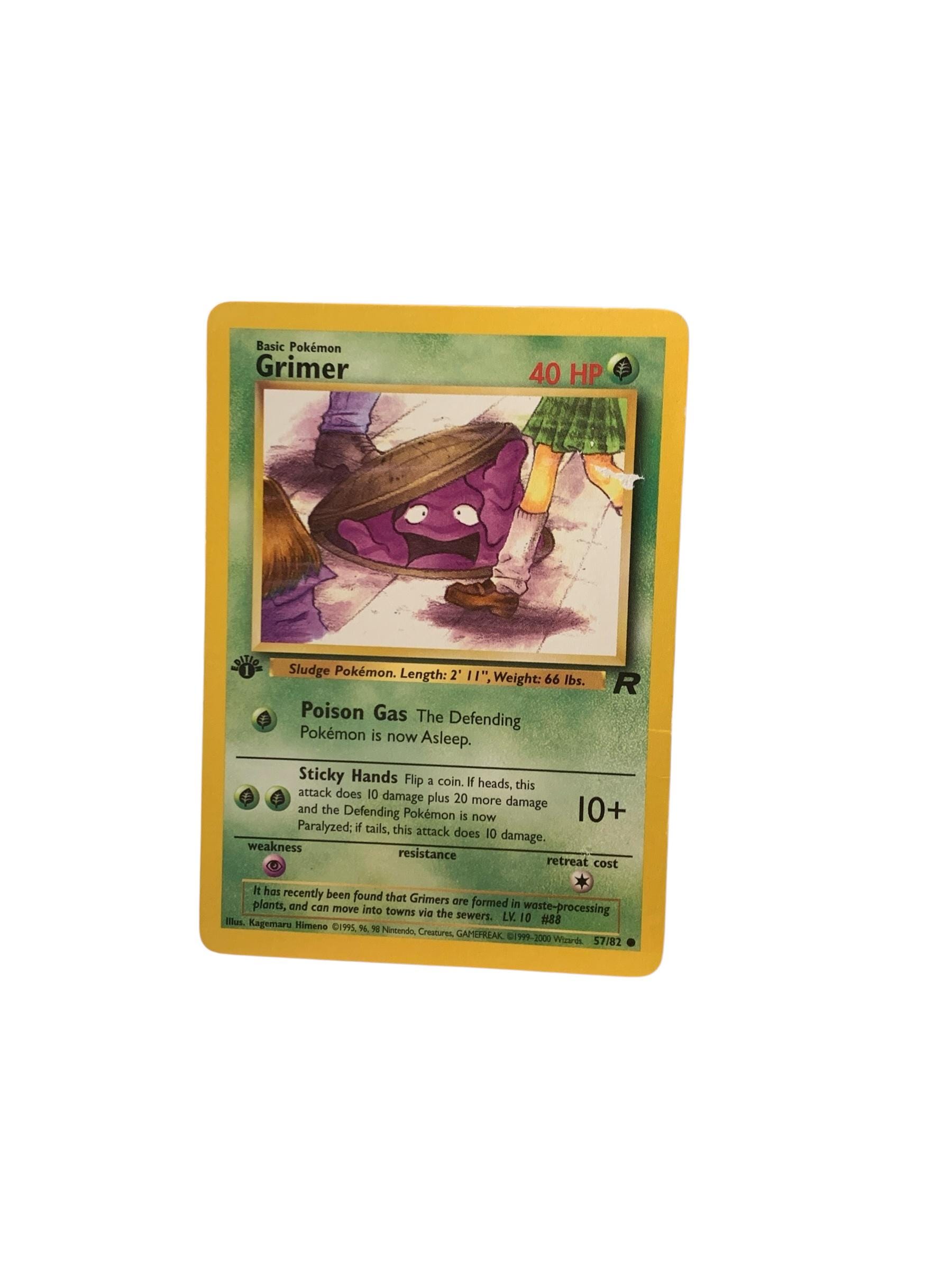 1995 grimer pokemon card 1st Edition The Defending Pokemon is now Poisoned. 1st Edition Grimer 57/82 Team