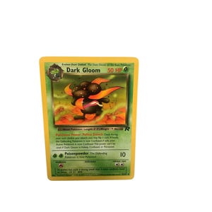 Carta coleccionable de Pokémon TCG de Wizards of the Coast del Equipo Rocket 1999-2000 de Dark Gloom 36/82