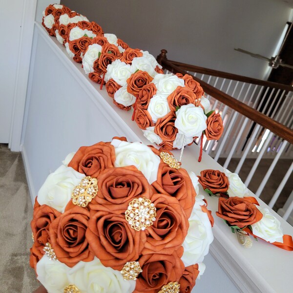 Bouquet de mariée orange brûlé et ivoire rose véritable