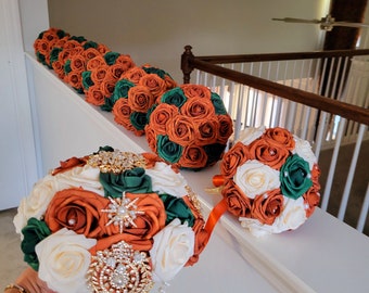 Real touch rose burnt orange/hunter green bouquets and boutonnieres