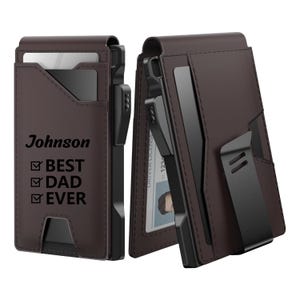 May include: A brown leather wallet with a black clip and card slots. The wallet has the name "Johnson" and the text "BEST DAD EVER" printed on the front. The wallet is shown open and closed.