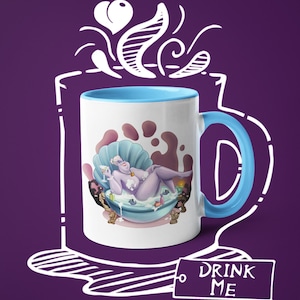 May include: White ceramic mug with a blue interior and handle. The mug features a cartoon illustration of a purple character in a seashell bathtub. The words "DRINK ME" are printed on a tag. The mug is set against a purple background.