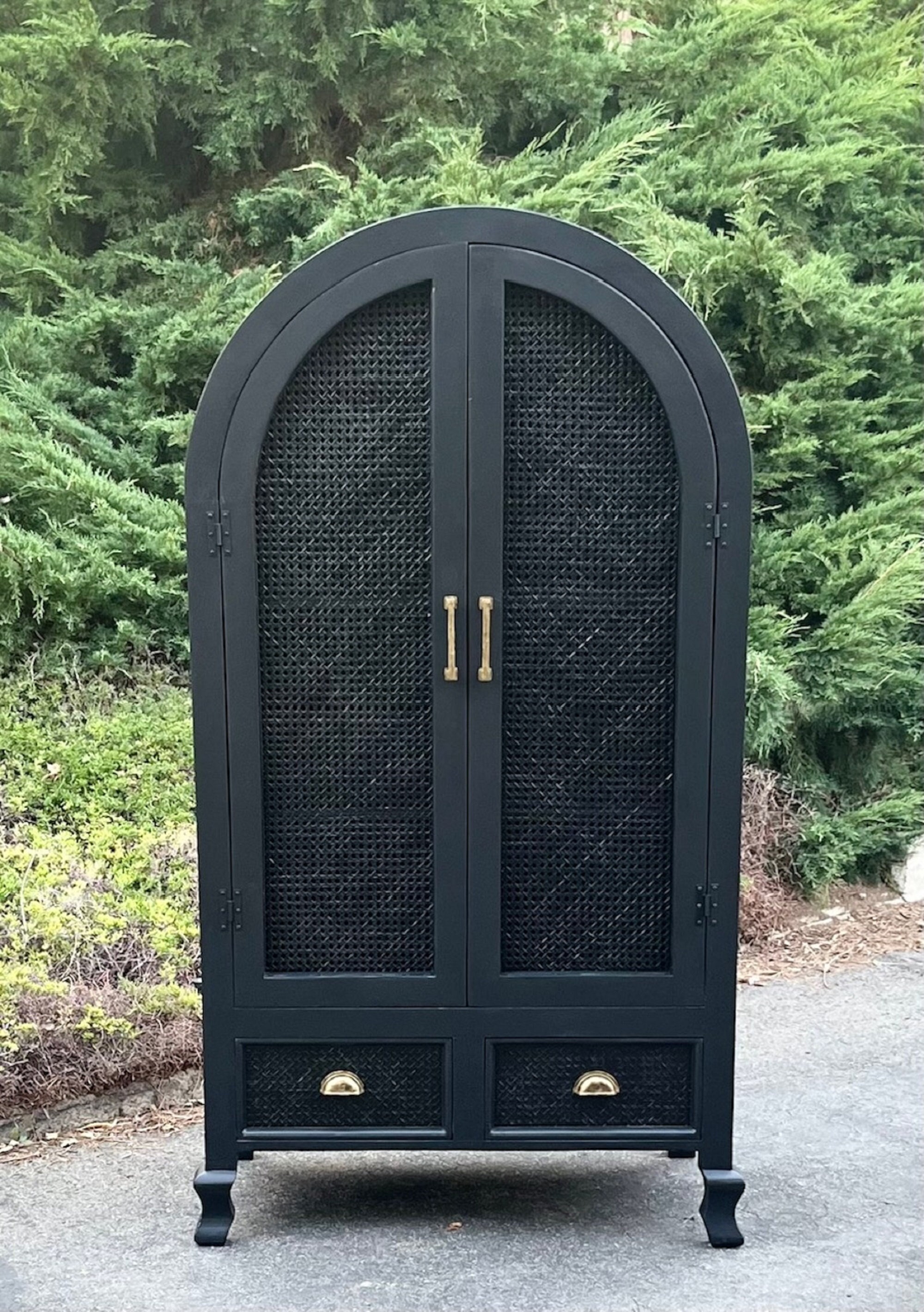 Black Arched Cabinet With Double Doors and Rattan Caning. One of a