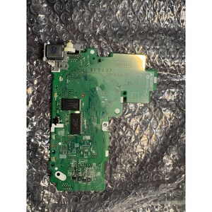 May include: A green printed circuit board featuring various electronic components, including integrated circuits, resistors, and a small white gear mechanism. The board is marked with the text XD731X and includes a small metallic component labeled F6.