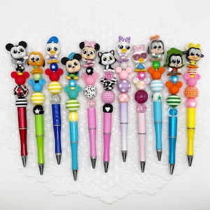 Mickey and Friends Autograph pen, beaded ballpoint pen with Disney Doorable, Daisy Duck, Pluto, Minnie Mouse , Figaro, Mickey, Goofy