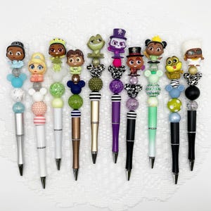 Caneta autógrafo inspirada na Princesa e o Sapo, caneta esferográfica com contas e Disney Doorable, Príncipe Naveen, Tiana, Louis, Charlotte