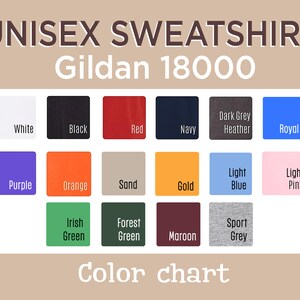 May include: A Gildan 18000 unisex sweatshirt color chart displaying seventeen square color swatches with labels including White, Black, Red, Navy, Dark Grey Heather, Royal, Purple, Orange, Sand, Gold, Light Blue, Light Pink, Irish Green, Forest Green, Maroon, and Sport Grey.
