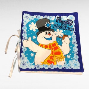 Livre en tissu Frosty le bonhomme de neige Cranston VIP en tissu estampé Lecture des fêtes pour enfants