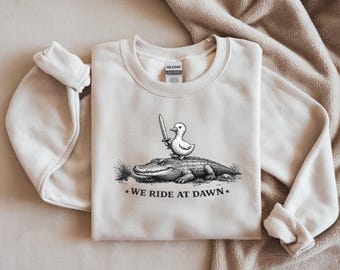 We Ride At Dawn Duck Shirt, Funny Duck Riding Alligator Tee, Medieval Duck Meme Shirt, Funny Animal Warrior Shirt, Vintage Duck Graphic Tee