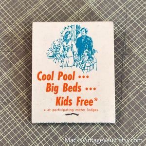 May include: Vintage matchbook cover with a retro illustration of a family and the text "Cool Pool... Big Beds... Kids Free*". The cover is white with blue and orange text and graphics, advertising a motor lodge.