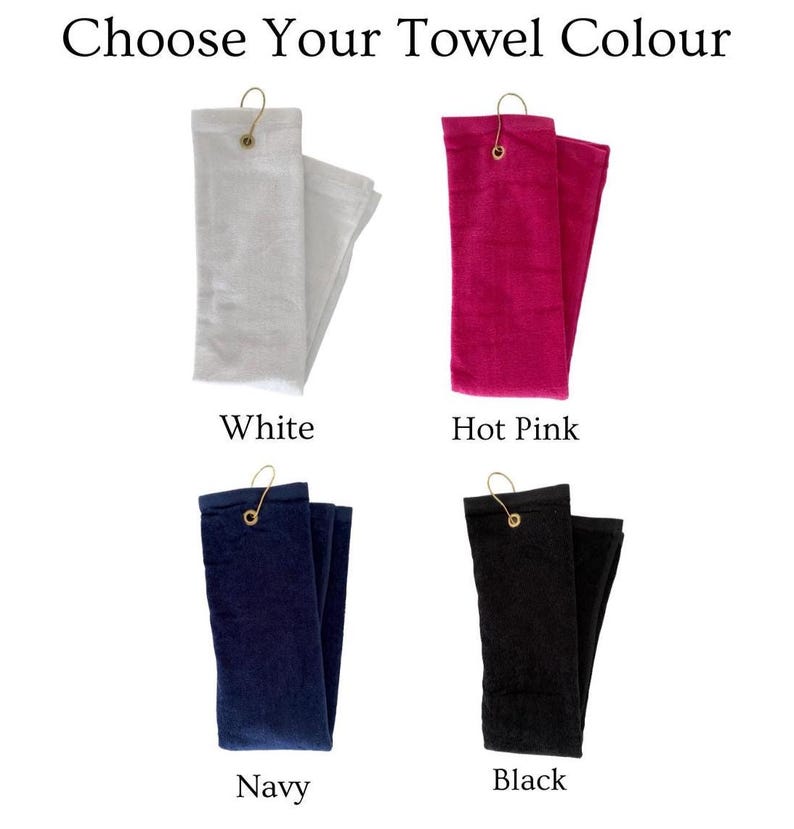 May include: Image shows four folded towels in white, hot pink, navy, and black. Each towel has a gold-colored metal hook. The text at the top says "Choose Your Towel Colour".