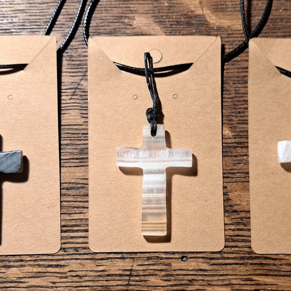 Onyx Cross pendant wrapped with durable, waxed string- comes on an adjustable black cord necklace. Stone Cross Necklace. Stone Cross Pendant