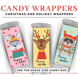 May include: Three printable Christmas candy bar wrappers featuring a bunny, reindeer, and raccoon. The wrappers are designed for snack-sized candy bars and include festive holiday greetings.