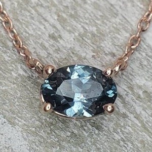 Montana sapphire necklace. 14k  rose gold oval sapphire necklace. Beautiful deep teal blue US sapphire in horizontal setting. Amazing color.