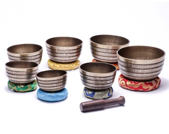 Singing Bowls Set of 7 Tibetan Handmade| Mantra carvings| Buddha eyes |Om symbol - Meditation & Yoga|Sound Healing|Gift 7 chakra set