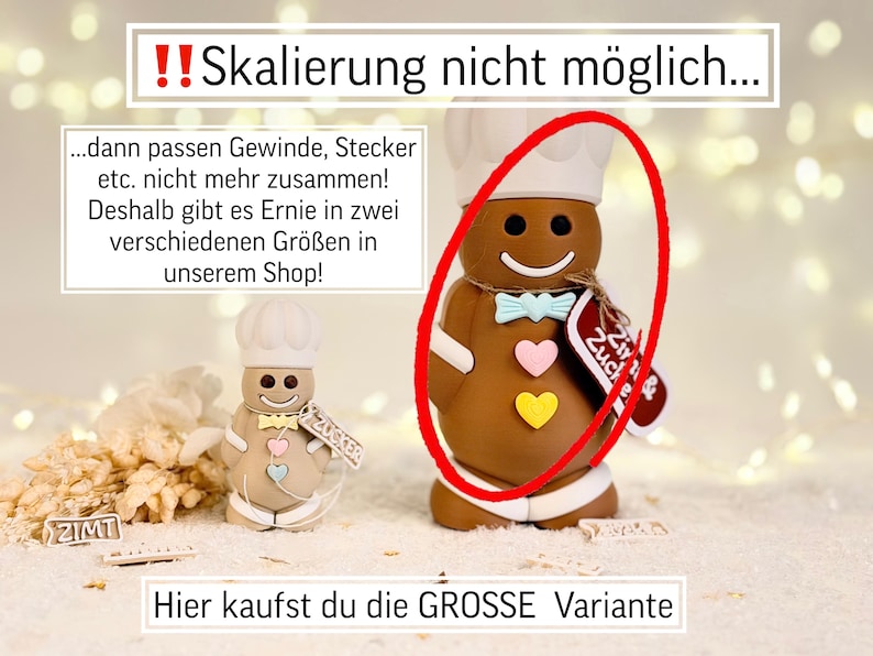May include: A brown gingerbread man figurine wearing a chef's hat and bow tie, with pink and yellow heart accents. The figurine has a tag that says "Zucker". The text in the image says "Hier kaufst du die GROSSE Variante".