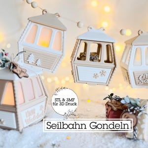 Puede incluir: Varios adornos decorativos con forma de góndola, en crema y beige, algunos con el texto "From Santa" o "Winter Wonderland". La imagen también incluye el texto "Seilbahn Gondeln" y "STL & 3MF für 3D Druck".