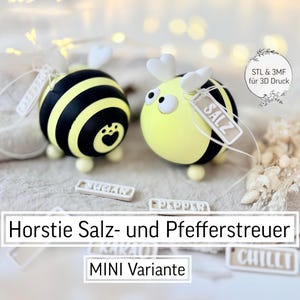 Puede incluir: Juego de tres tazas de cerámica con acabado mate moteado. Las tazas son de color crema, gris claro y gris oscuro. Cada taza tiene un diseño simple y minimalista.