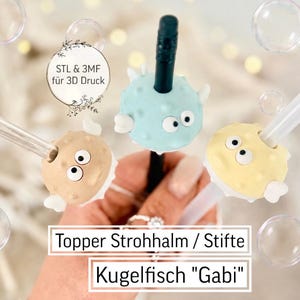 May include: Three colourful pufferfish-shaped toppers for straws or pens. The toppers are light brown, light blue, and yellow, each with cartoon eyes and a black straw or clear straw. Text on the image reads "Topper Strohhalm / Stifte Kugelisch "Gabi".