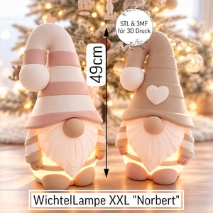 May include: Two gnome-shaped lamps, one with pink and white stripes and one with a solid tan hat featuring a white heart. Both have white beards and glowing bases. A vertical arrow indicates a height of 49cm. Text reads STL & 3MF für 3D Druck and WichtelLampe XXL Norbert.