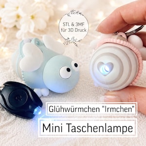 May include: A selection of small LED flashlights, including a bee and a sphere design, and a black keychain flashlight. The bee-shaped light is light blue with white details. The sphere light has a pink strap and a heart-shaped light.