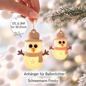 Könnte beinhalten: Zwei schneemannförmige Anhänger mit leuchtenden Körpern, jeweils mit Sternausschnitt, beigem Hut, Schal und stockartigen Armen. Der Text "STL & 3MF für 3D Druck" und "Anhänger für Ballonlichter Schneemann Frosty" ist auf dem Bild zu sehen.