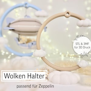 Puede incluir: Móvil para bebé beige y azul con diseño de zeppelin. El móvil presenta un marco circular con elementos en forma de nube y zeppelin. El texto en la imagen dice "Wolken Halter" y "STL & 3MF für 3D Druck".