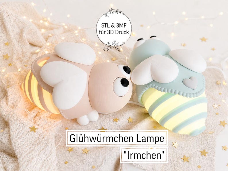 May include: Two bee-shaped lamps labelled Gl&uuml;hw&uuml;rmchen Lampe Irmchen, one in soft pink and one in light blue. Both feature white wings, large round eyes, and glowing striped abdomens. A circular label above reads STL & 3MF f&uuml;r 3D Druck.