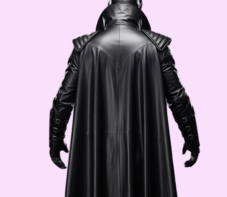 May include: A black leather coat with a high collar and cape-like design. The coat features quilted shoulder pads and is worn with matching gloves. The back view showcases the coat's sleek, streamlined silhouette.