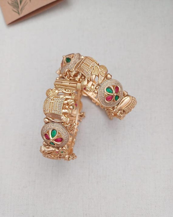 Handcrafted Rajwadi Gold Plated Elephant Bangles: Ruby Green Stone