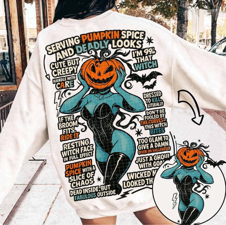 May include: White sweatshirt with a Halloween-themed graphic. The design features a woman with a pumpkin head, wearing a black corset and boots. Text includes "Serving Pumpkin Spice and Deadly Looks" and "I'm 99% That Witch."